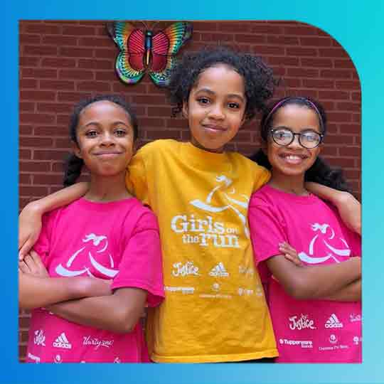 Girls on the Run participants in logo t shirts